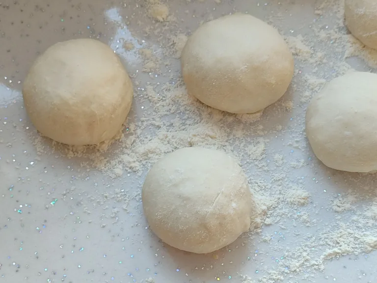 Smooth, tight pizza dough balls after dividing